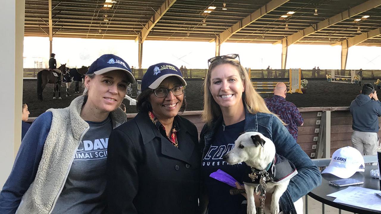 Assistant Dean Christine Schmidt, Dean Helene Dillard, Amy McLean and Marshmallow at the UCD Equestrian meet