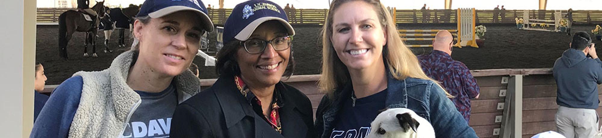 Assistant Dean Christine Schmidt, Dean Helene Dillard, Amy McLean and Marshmallow at the UCD Equestrian meet