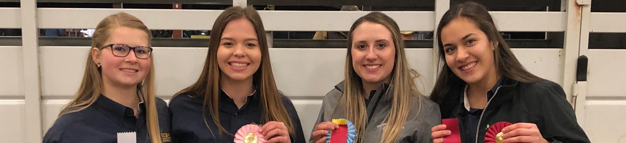 Alia Ames, Rebecca Castruita, Kate Harris, and Ashley Felsch at the California Collegiate Livestock Show